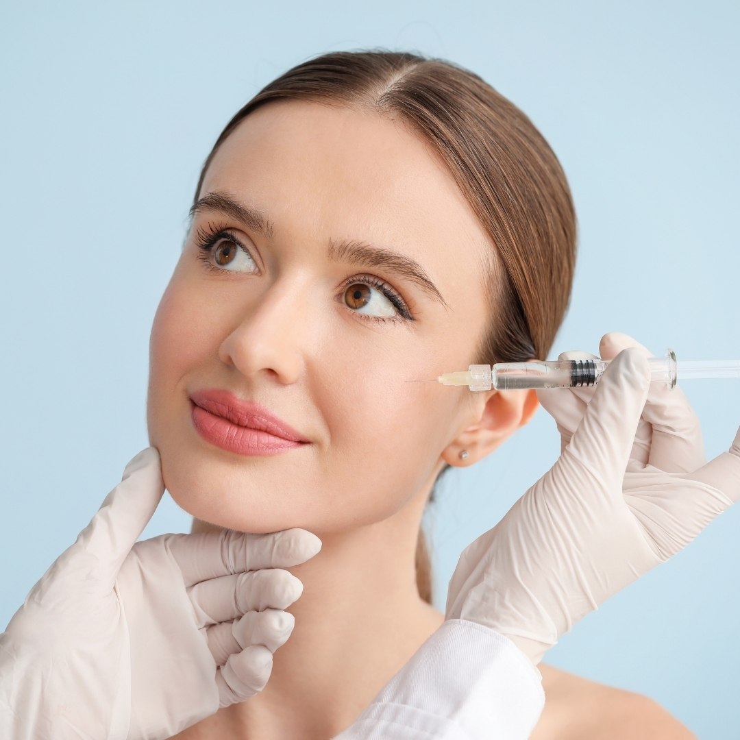 Woman with a relaxed, balanced jawline after Jaw Slimming & Bruxism treatment